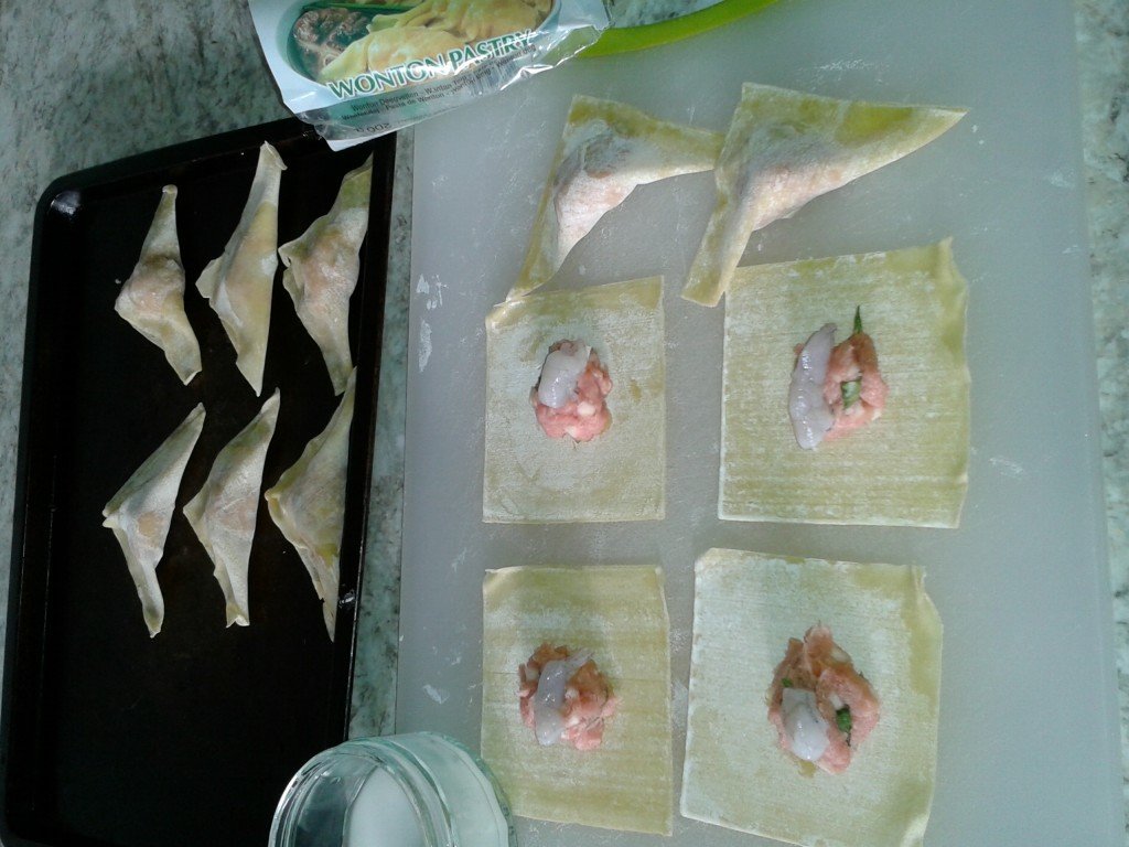 Wonton in various stages of preparation
