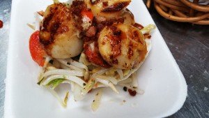 Fat juicy scallops with bacon and bean sprout.
