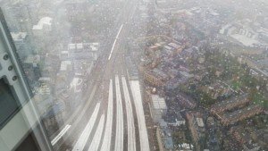 The Shard, view from the gallery. The white stripes are the tops of the trains. Some are making their way along the lines, Many are parked at the station.