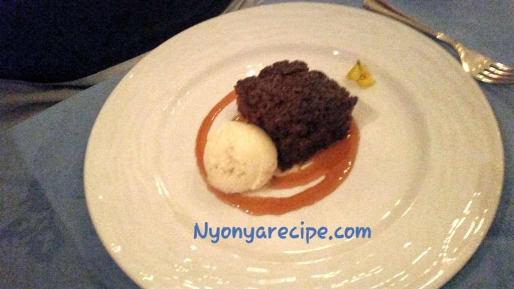 Neatly presented Sticky Toffee Pudding with butterscotch sauce and honeycomb ice-cream