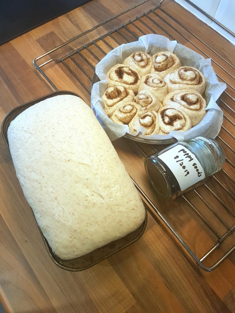 Bread and cinnamon rolls going to the garden.